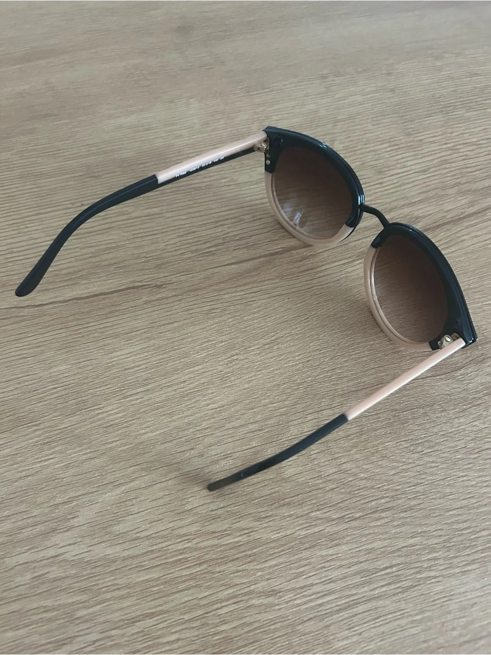 Tory Burch Women’s Round Black and Beige Sunglasses